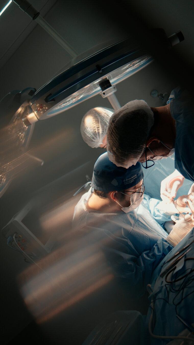 Surgical team gathered around the table